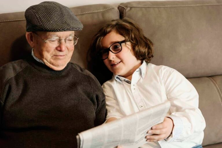About Inwisdoo Blog - grandfather-and-grandson-reading-the-news-
